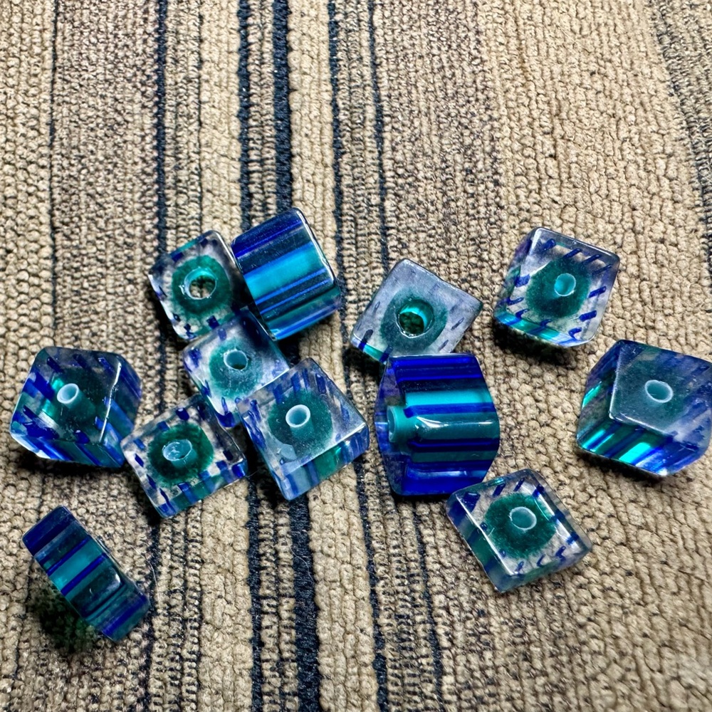 Mesmerizing Blue and Green Glass Art with Swirling Patterns